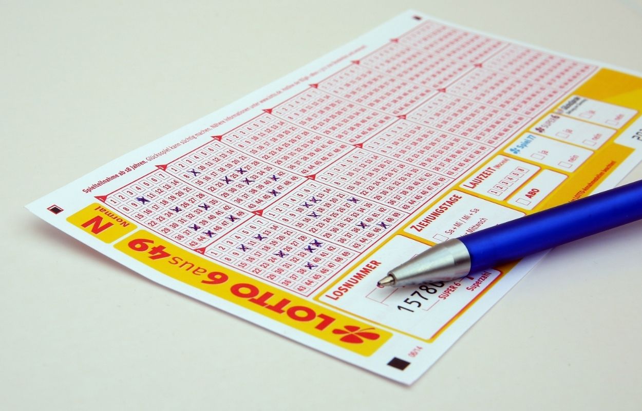 Imagem mostra jogo de loteria - simpatia para sorte