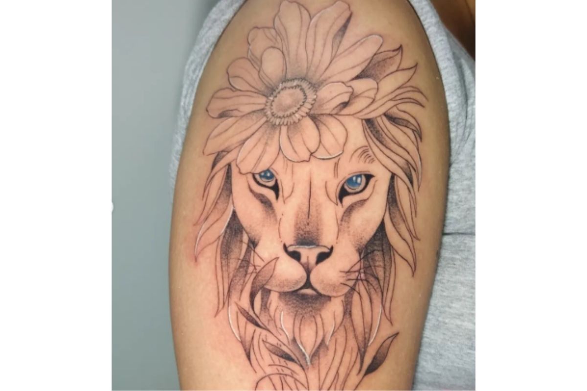 tatuagem de leão no braço